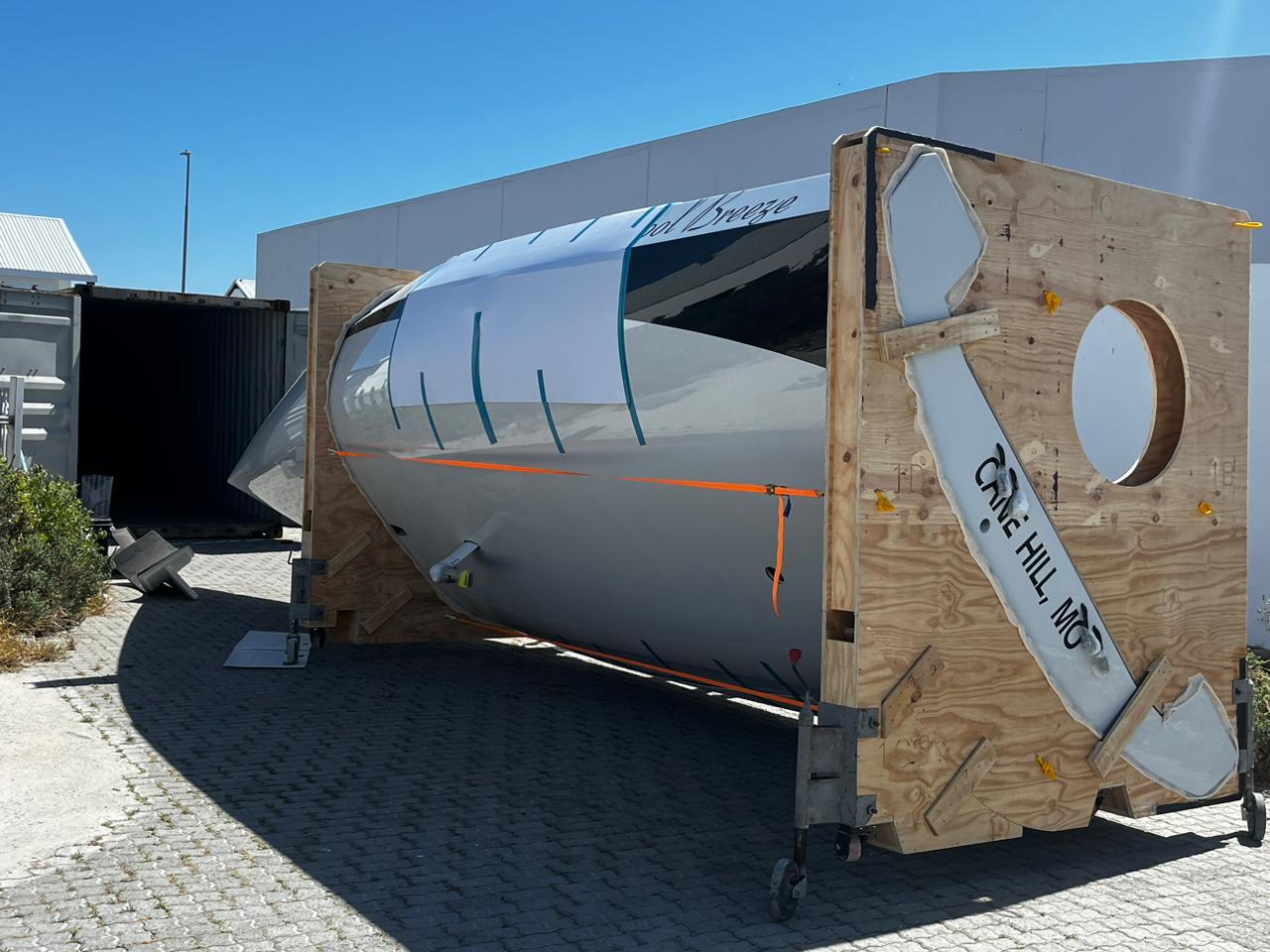 Yacht prepared for container shipping